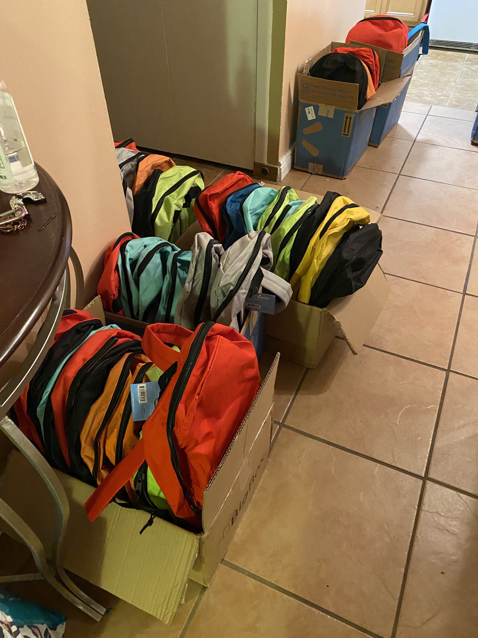 Colorful backpacks packed and ready for local students