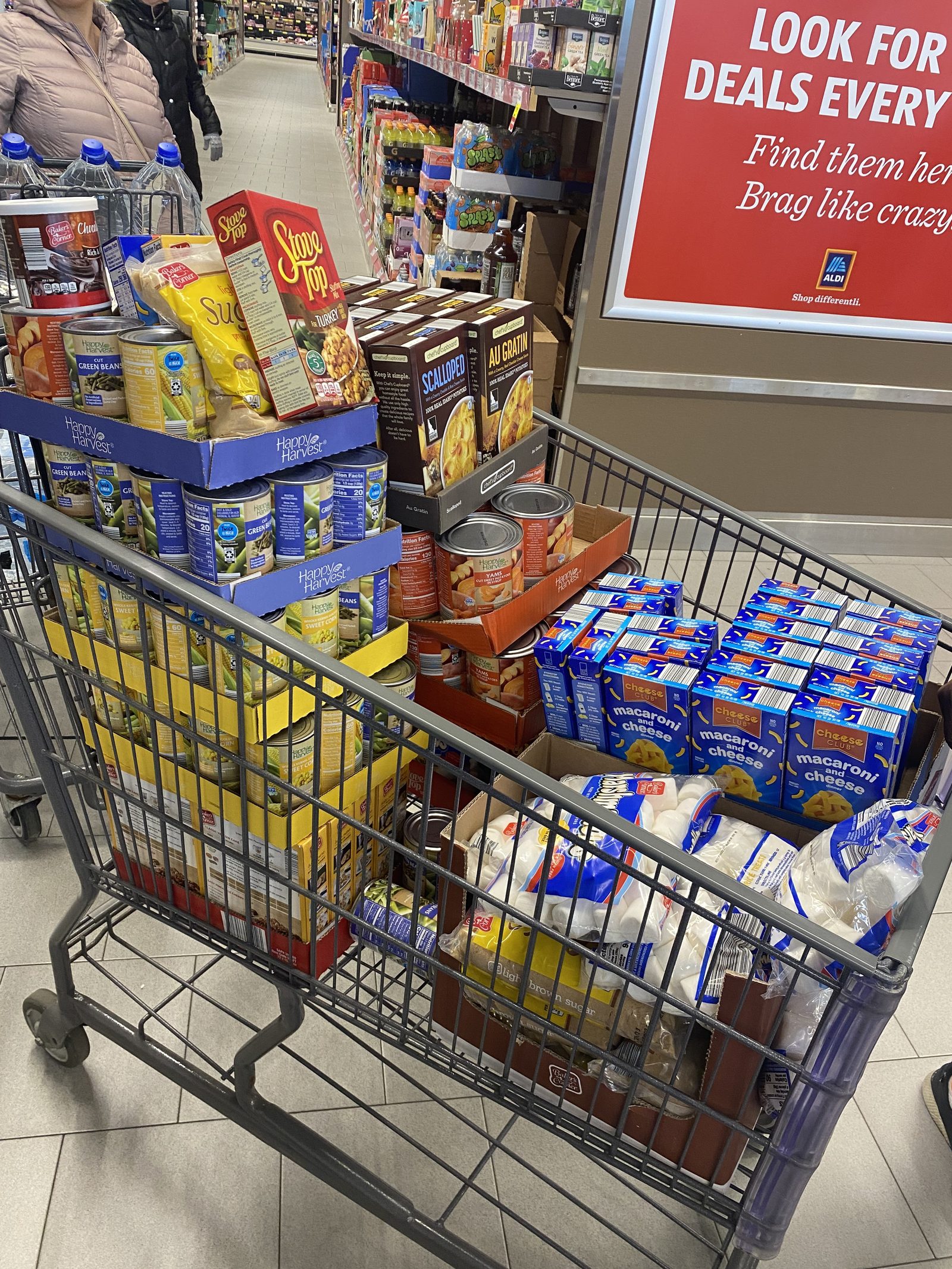 A cart full of groceries for a community food drive