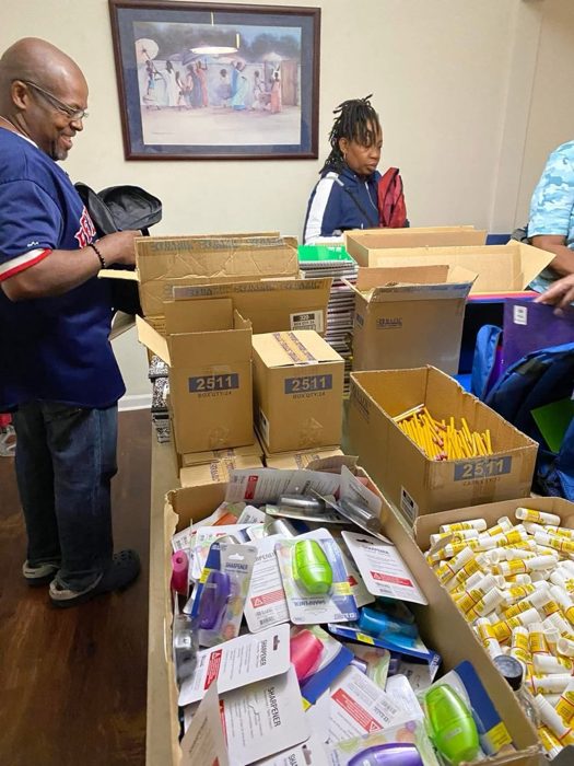Packing backpacks for students.