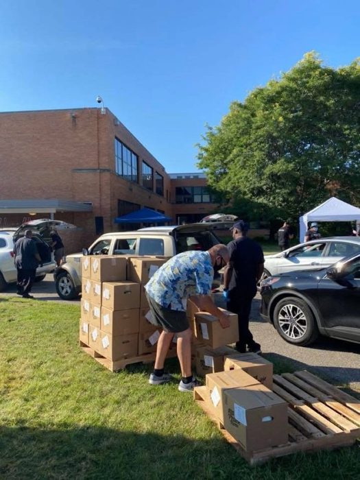 Outdoor food box distribution.