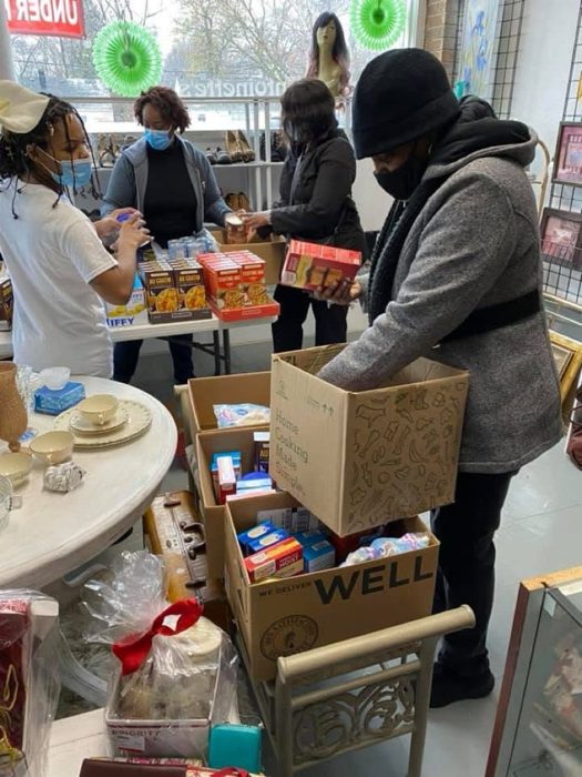Packing food boxes indoors.