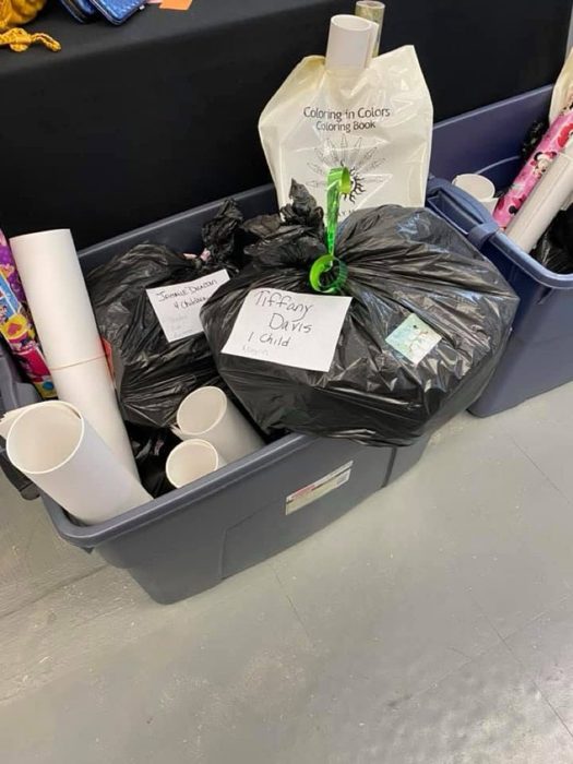 Personalized gift bags for neighborhood families.