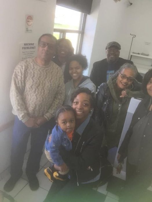 Laundromat outreach team with neighborhood families.