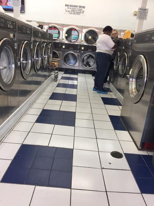 Laundromat outreach — doing laundry, building community.