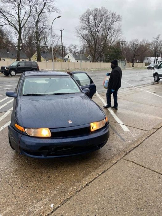 Drive-through distribution — rain or shine.