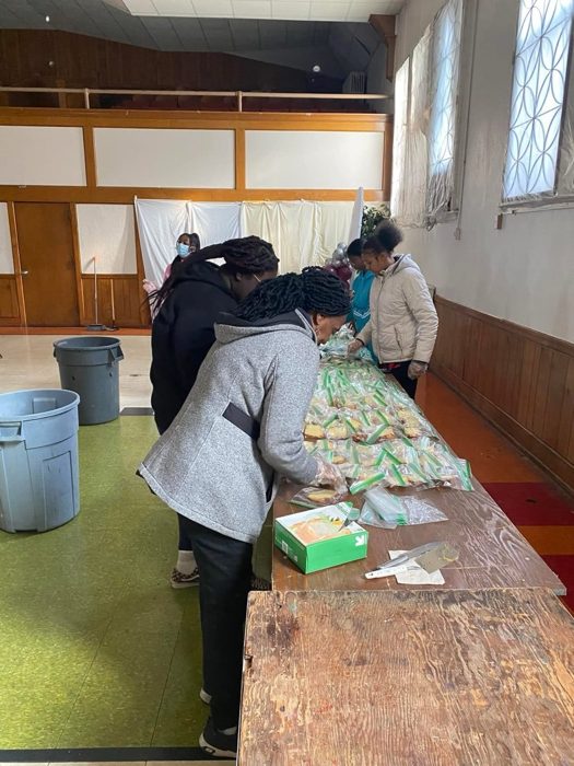 Sandwich assembly line — many hands, many meals.