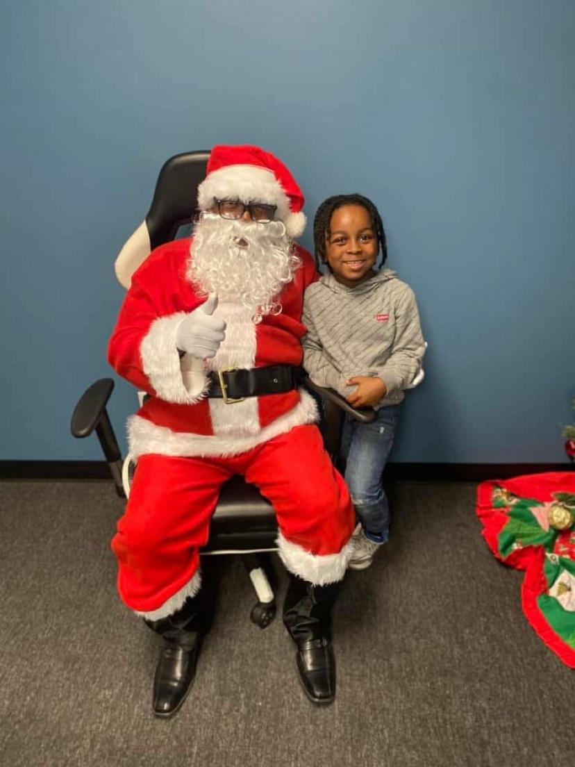 Santa posing with a child