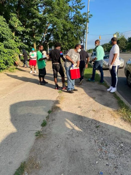 Meeting the community on the sidewalk.