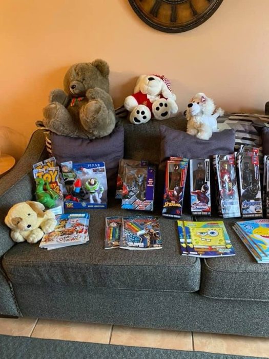Toy drive: teddy bears, action figures, and smiles.